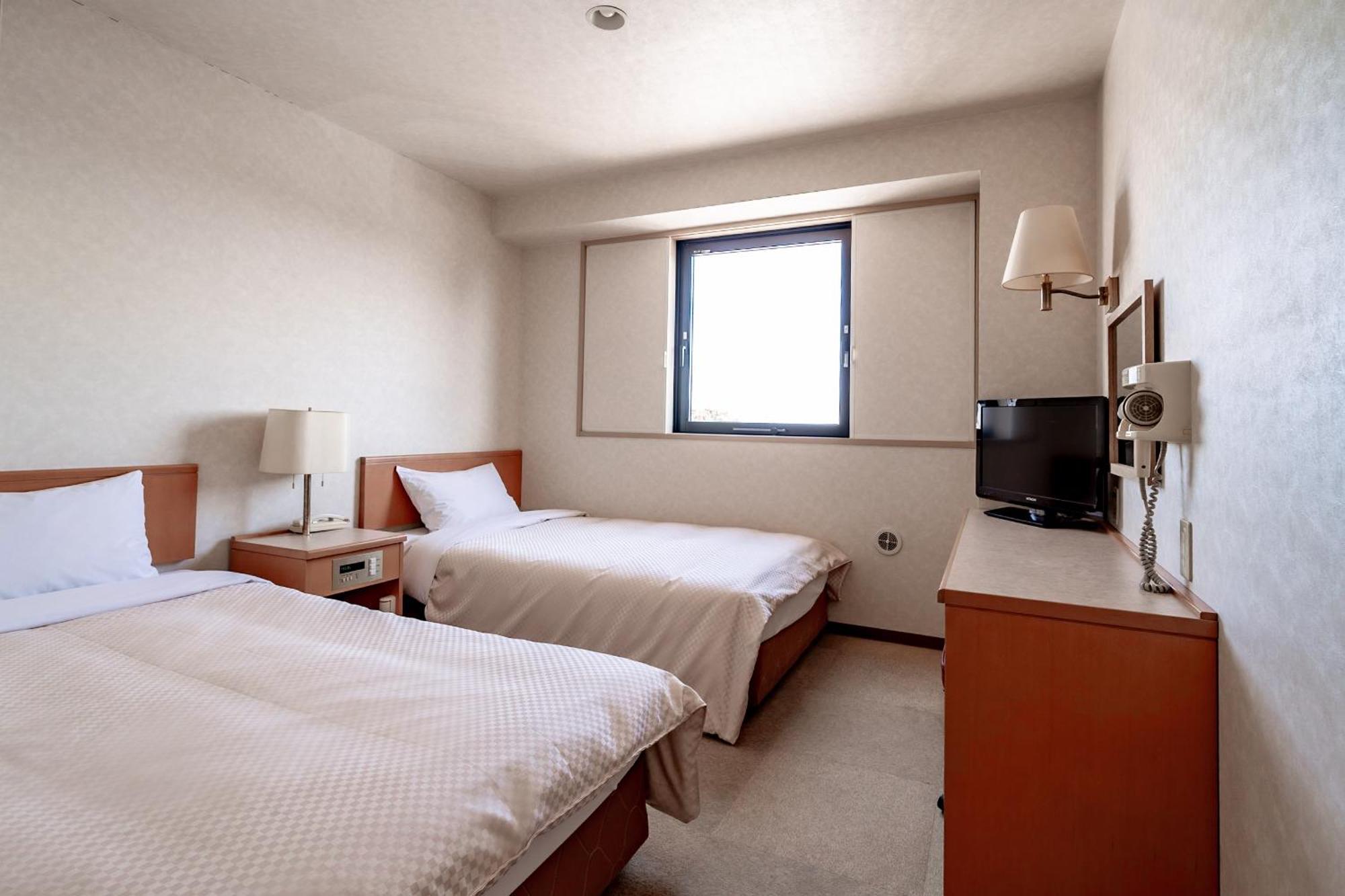 Business Hotel Kg أويتا المظهر الخارجي الصورة